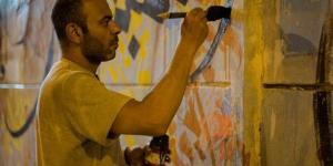 الفنان
      سامح
      إسماعيل
      قوميسيرا
      عامًا
      للدورة
      44
      من
      المعرض
      العام