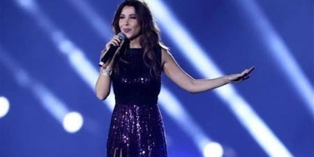 بعد طرحه، شاهد نانسي عجرم في كواليس أحدث كليباتها اشهدي يا دني - النيل نيوز